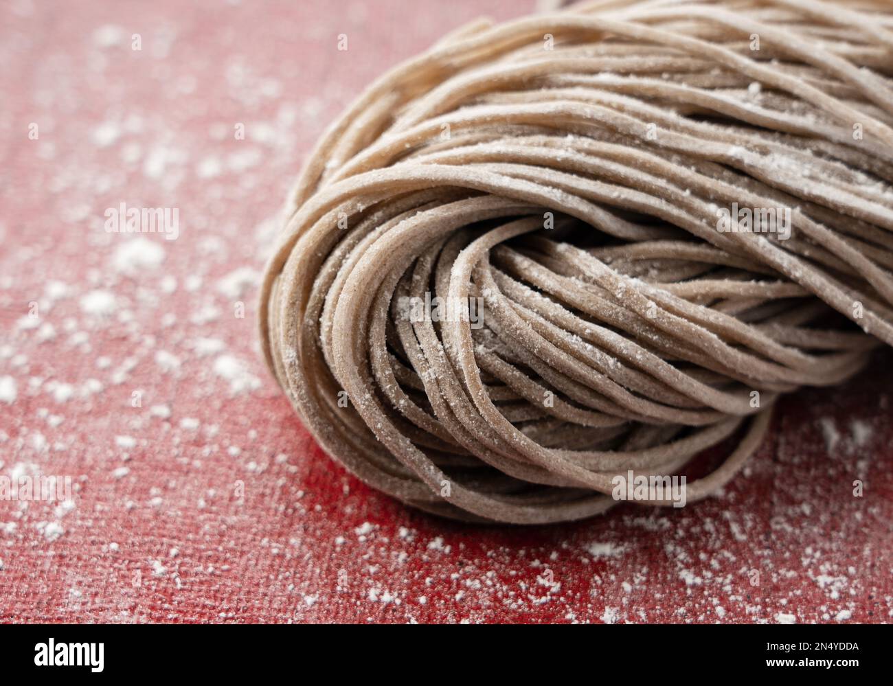 Closeup of raw soba noodles. Soba before boiling. Freshly made soba