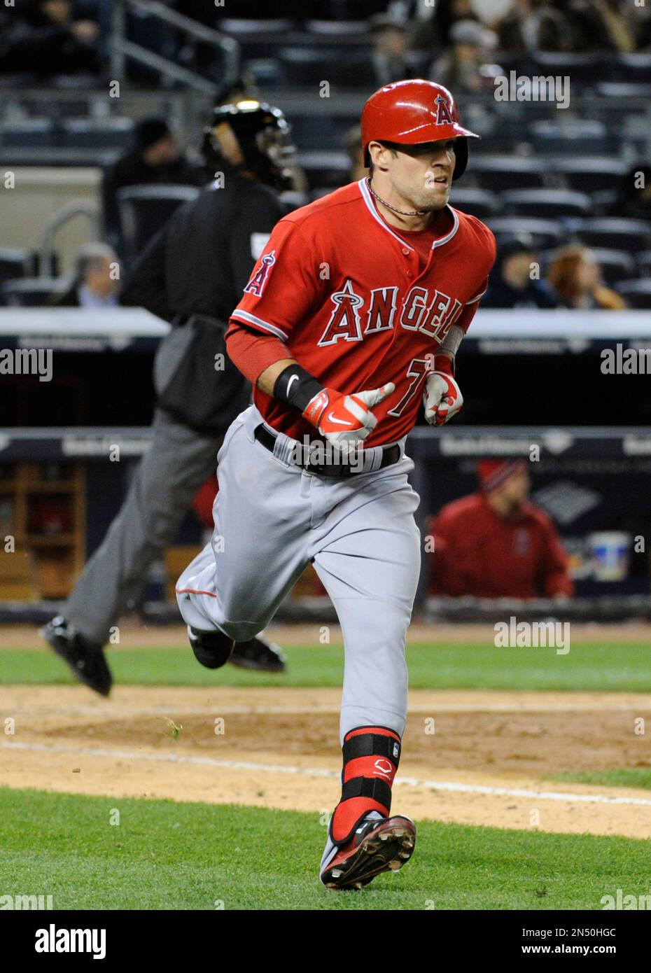 Los Angeles Angels' Colin Cowgill rounds the bases after hitting a home