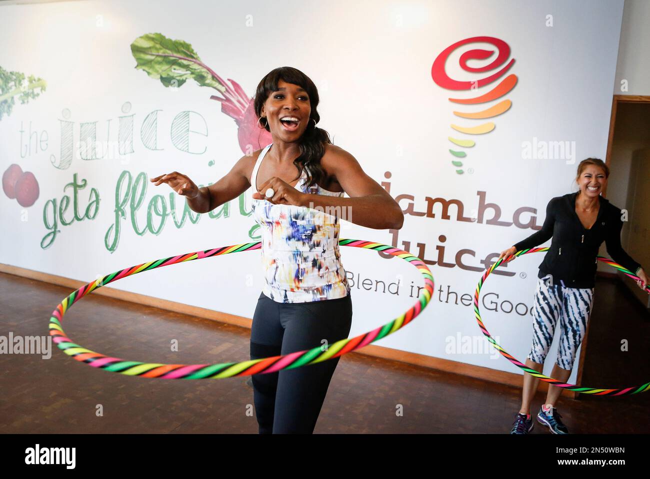 IMAGE DISTRIBUTED FOR JAMBA JUICE - Tennis superstar Venus Williams  participates in Hoopnotica, a fitness workout using hula hoops, as the host  of the fourth annual FiTrends Expo with Jamba Juice at