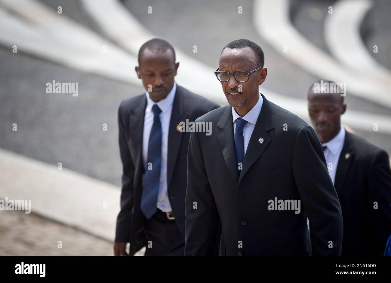 Rwandan President Paul Kagame Center Flanked By Security Personnel Leaves After Lighting A 5928