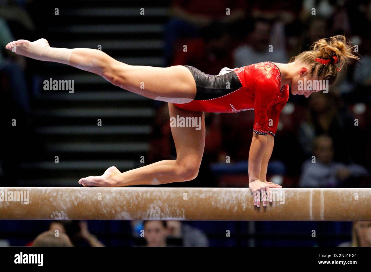 Arkansas' Katherine Grable competes on the balance beam during the NCAA ...