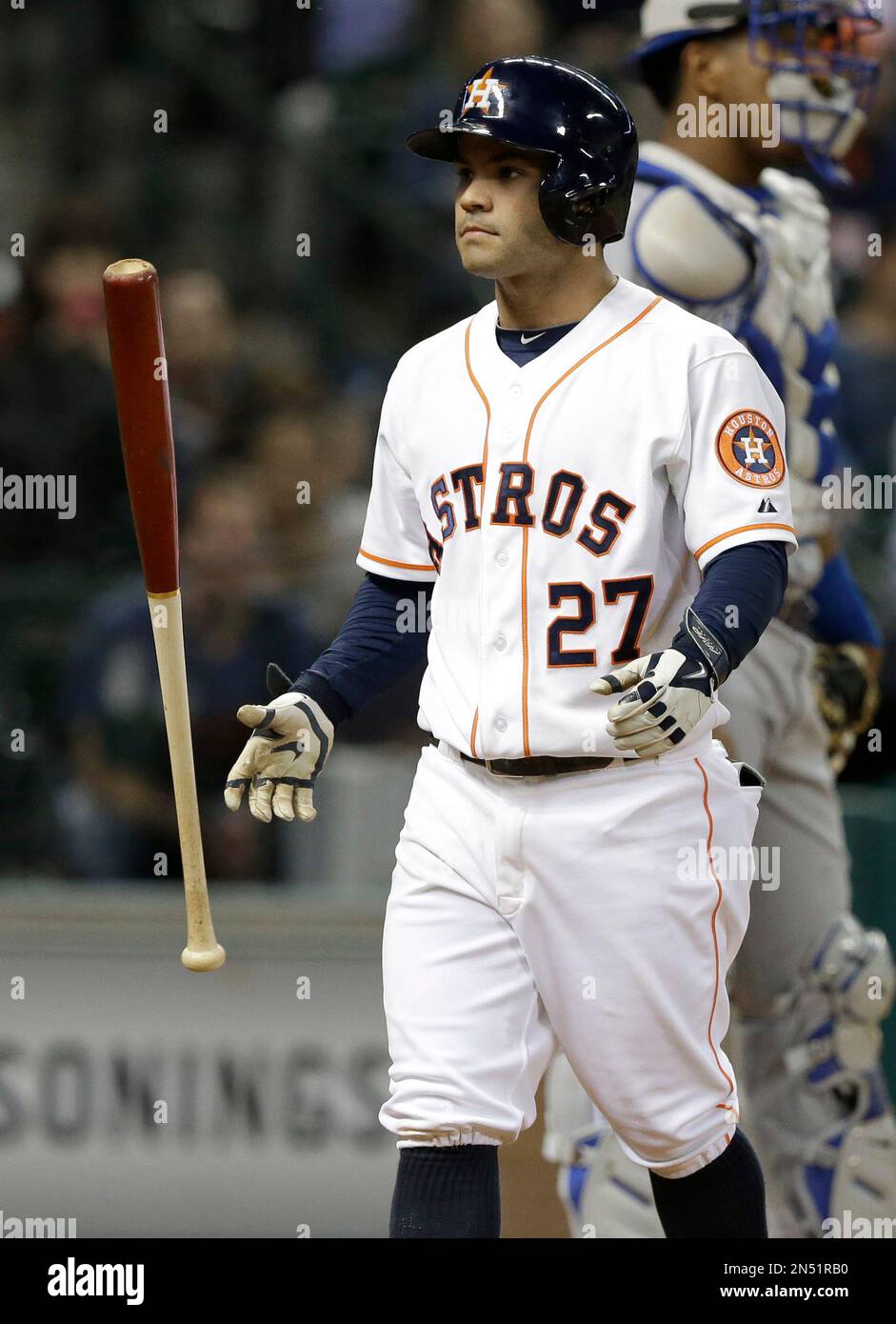 Houston Astros' Jose Altuve tosses his bat after called out on