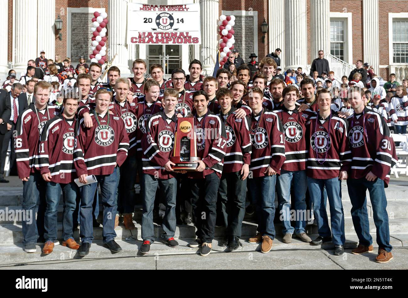 Members of the Union College men's hockey team pose with their trophy