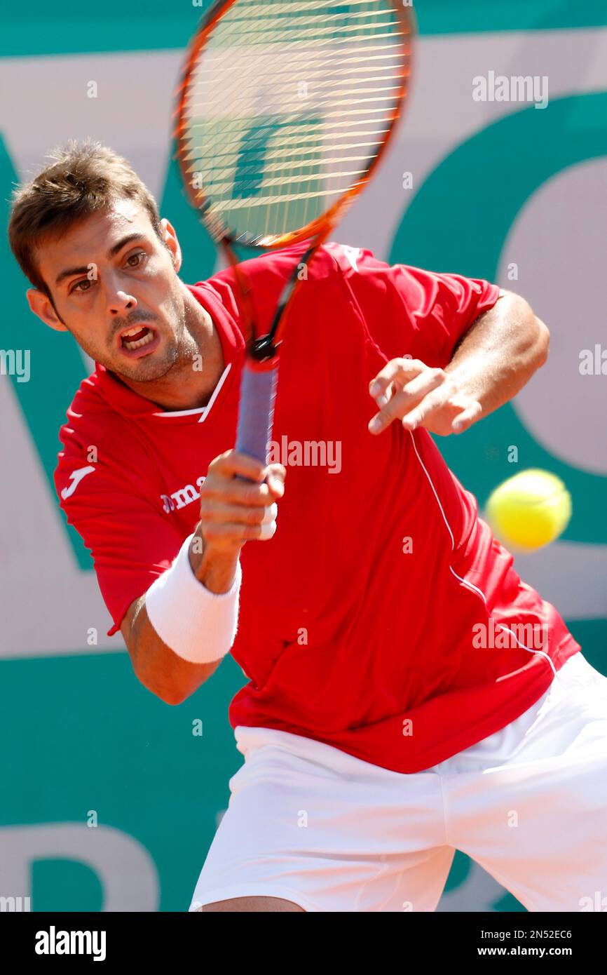 Marcel Granollers of Spain plays a shot against Spain's Guillermo  Garcia-Lopez, in the final of the Grand Prix Hassan II tennis tournament in  Casablanca, Morocco, Sunday, April 13, 2014. Guillermo Garcia-Lopez defeated