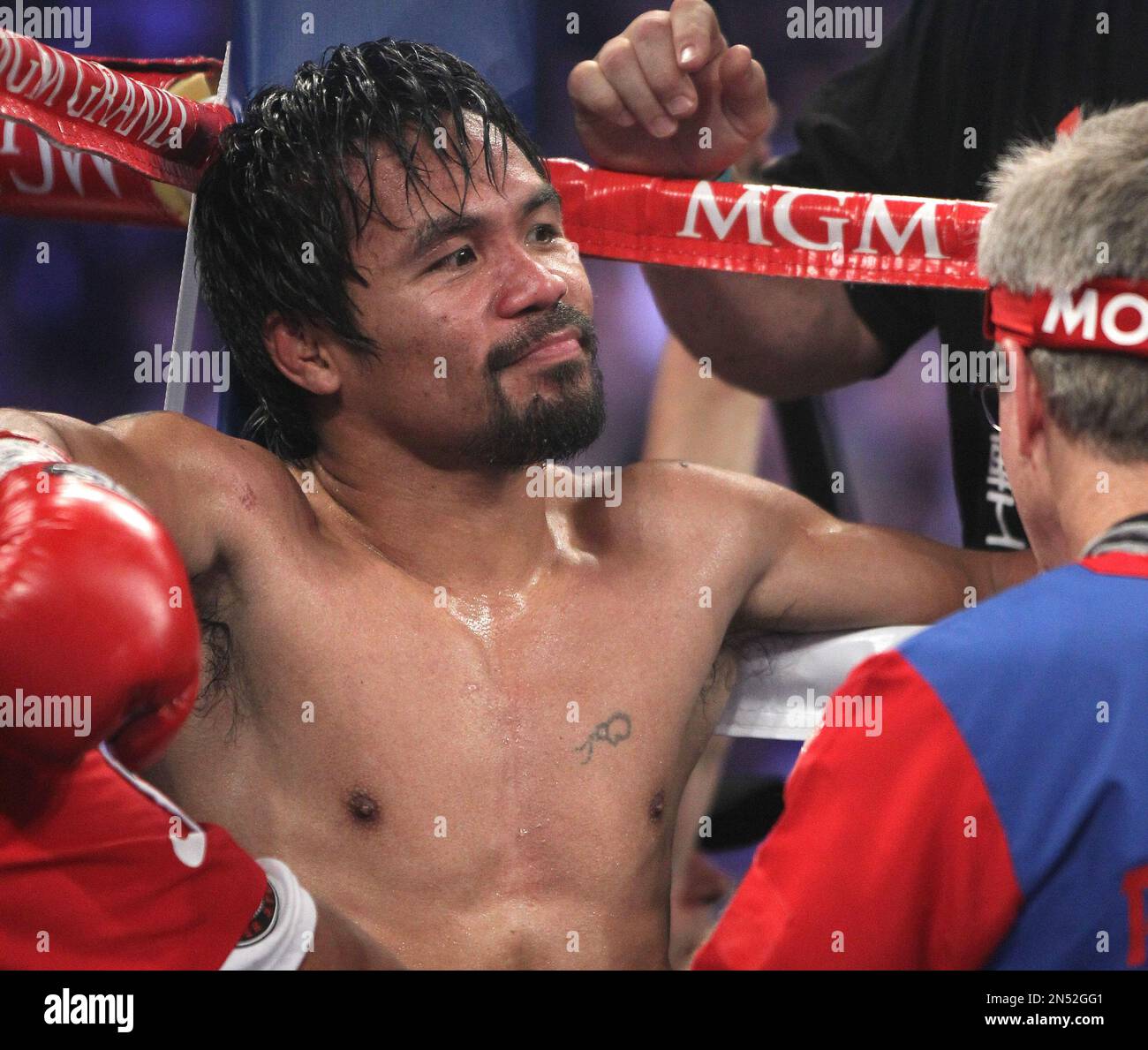 Manny Pacquiao, of the Philippines, sits in his corner between rounds