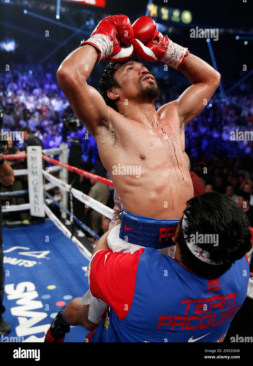 Manny Pacquiao, of the Philippines, celebrates his unanimous decision