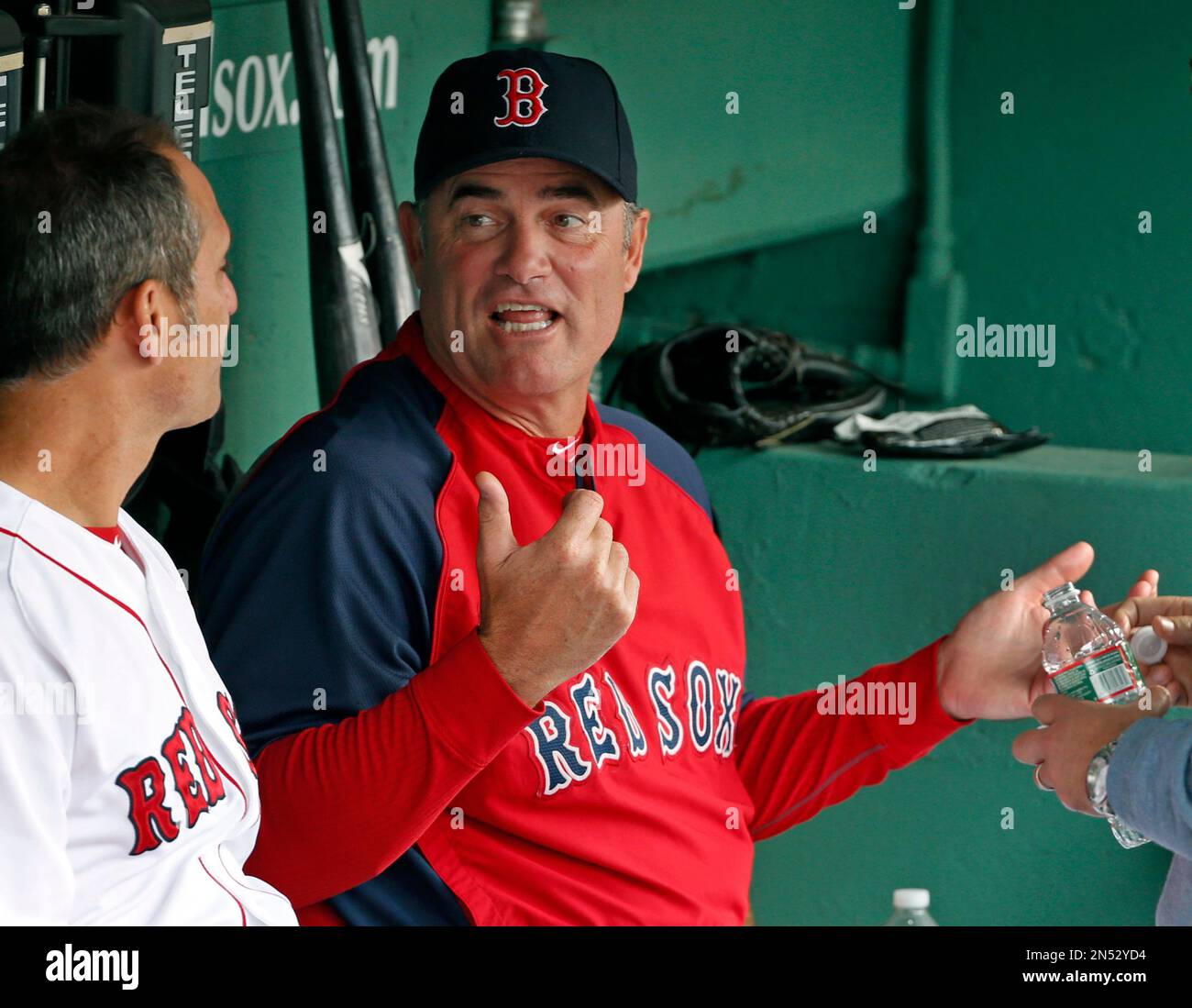 Boston Red Sox manager John Farrell chats in the dugout prior to a