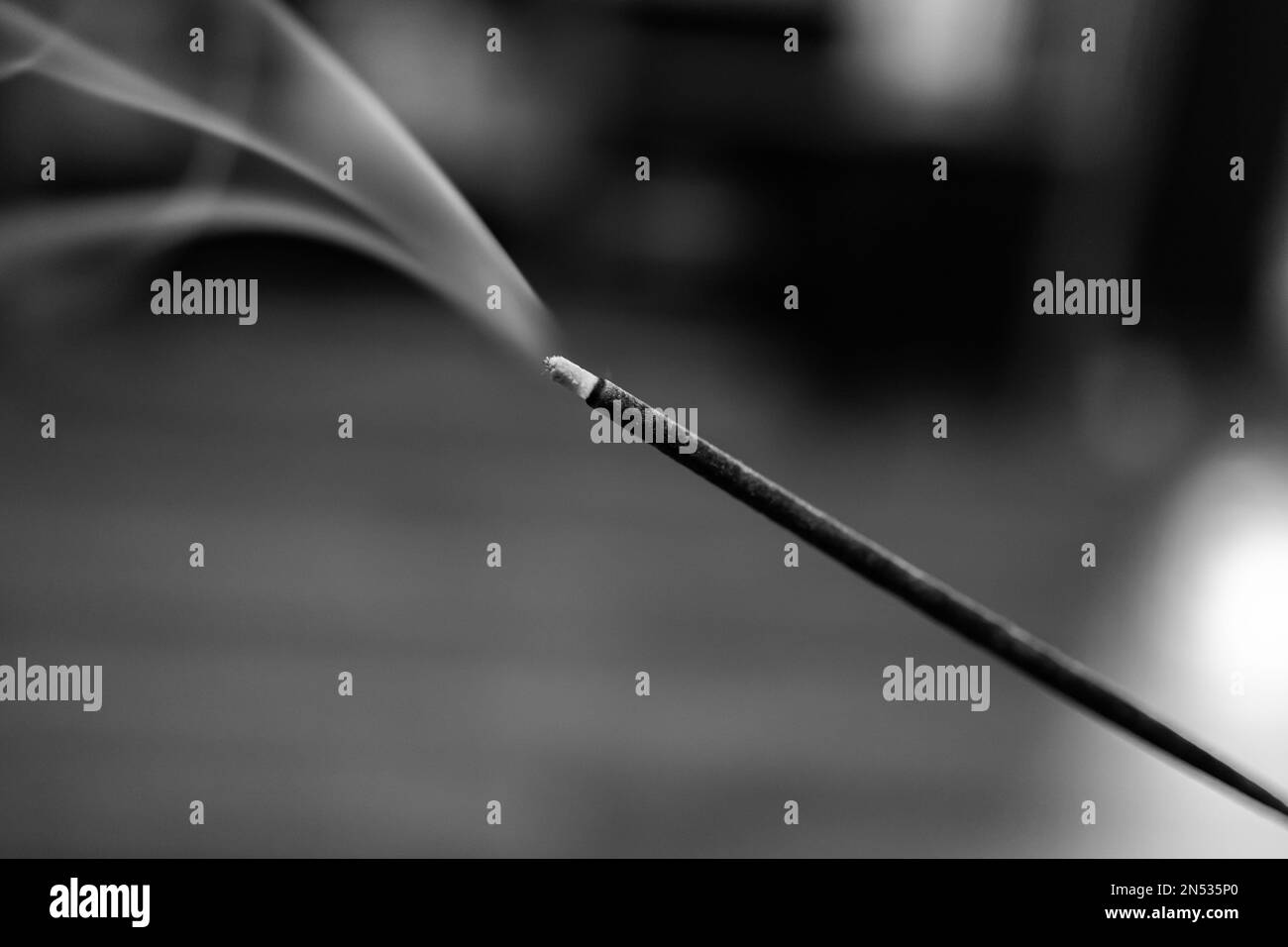 Burning of incense Black and White Stock Photos & Images - Alamy