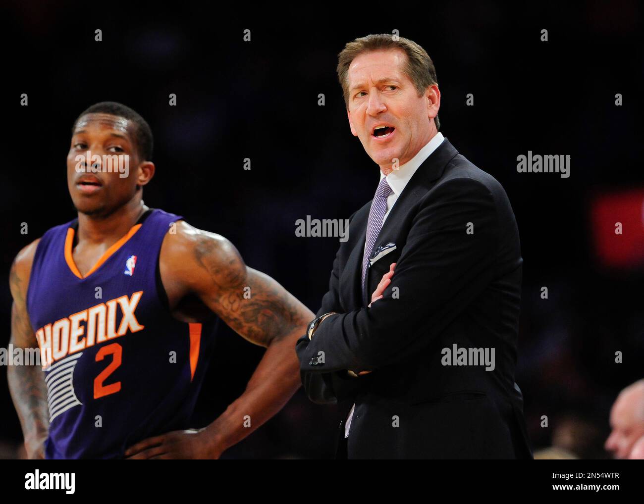 Phoenix Suns head coach Jeff Hornacek reacts during a timeout as Phoenix Suns guard Eric Bledsoe (2) looks on in the first half of an NBA basketball game against the Los Angeles Lakers, Sunday, March 30, 2014, in Los Angeles.(AP Photo/Gus Ruelas) Stock Photo
