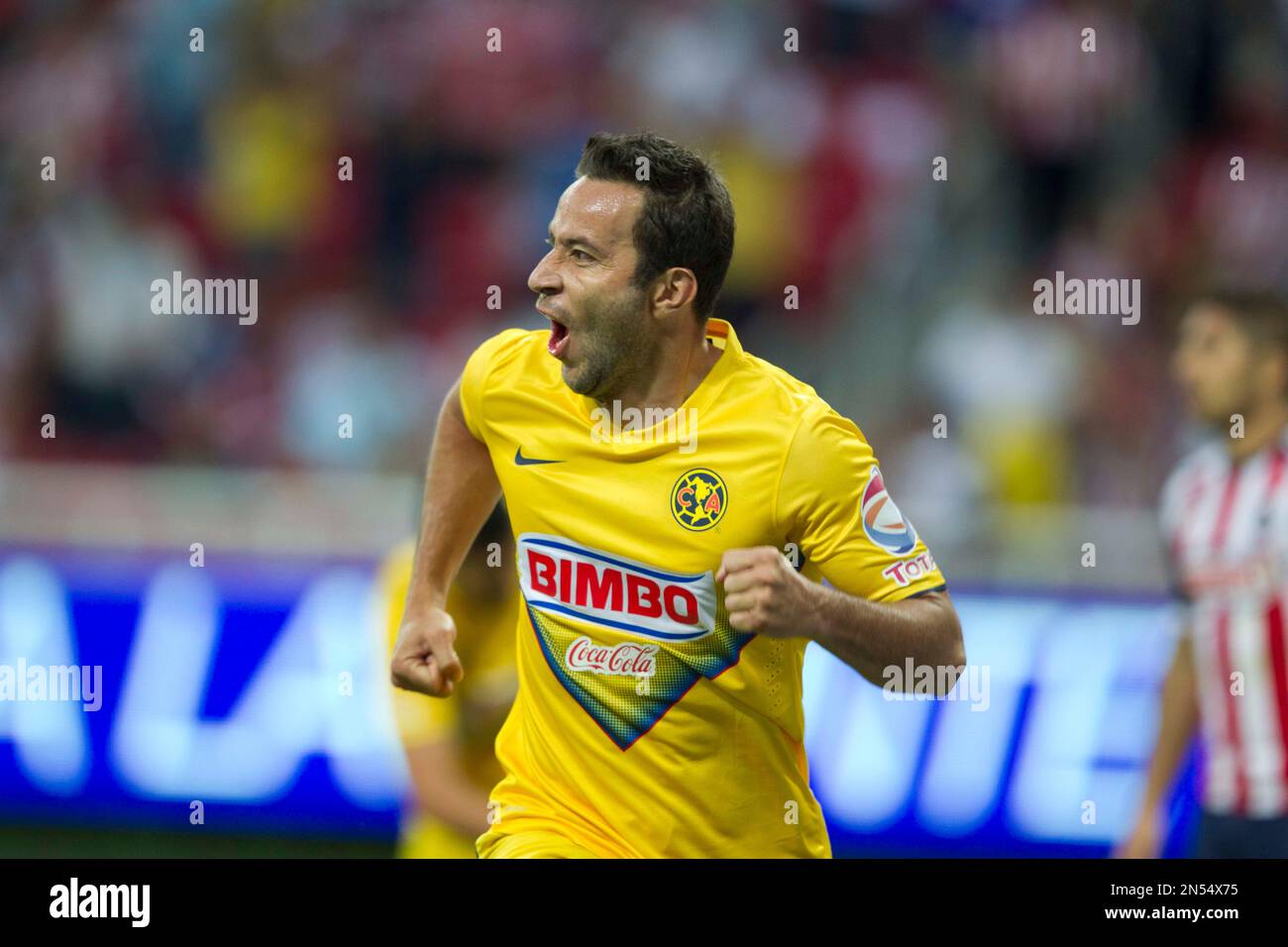 America's Gabriel Rey celebrates a goal against Guadalajara during a ...
