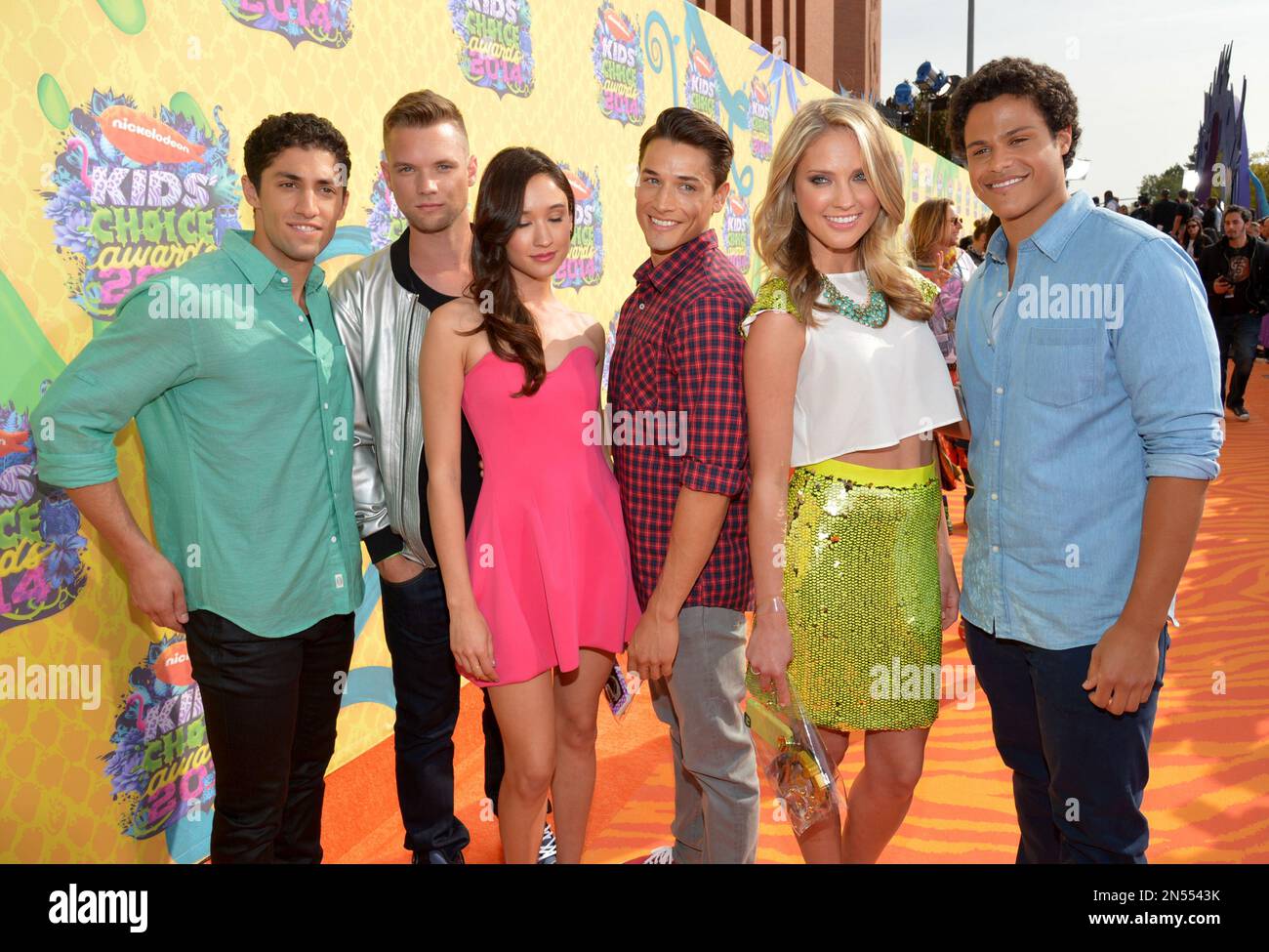 Azim Rizk, and from left, Cameron Jebo, Christina Masterson, Andrew Gray,  Ciara Hanna and John Mark of the Loudermilk of Mighty Morphin Power Rangers  arrive at the 27th annual Kids' Choice Awards