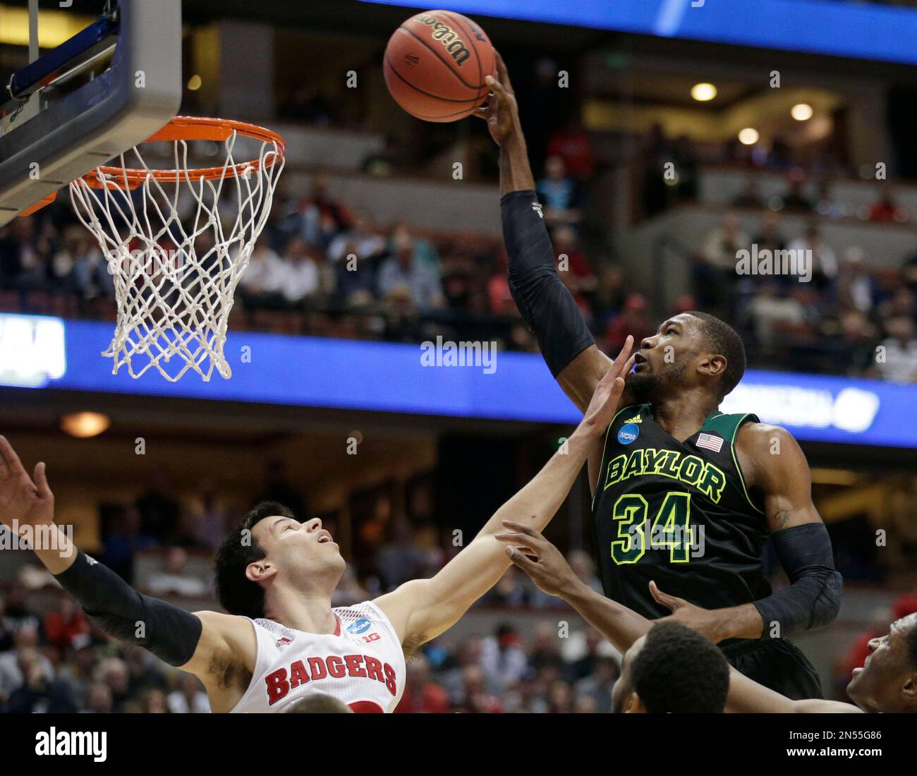 Wisconsin forward Duje Dukan, left, defends against Cory Jefferson (34