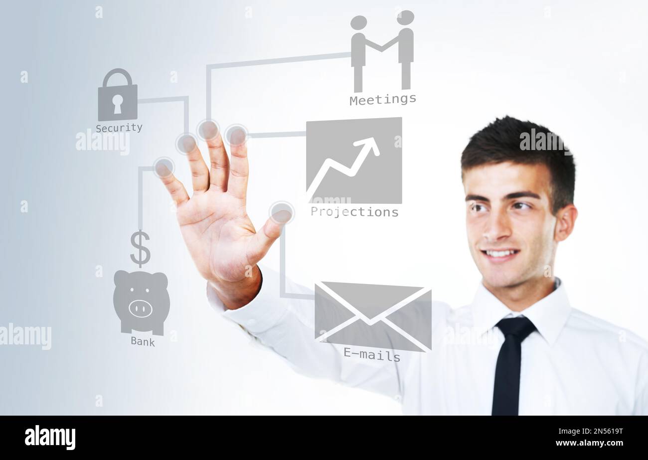 The future at my fingertips. A business man touching a virtual touch