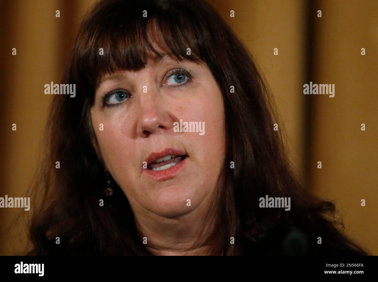 Boston Marathon bombing survivor Karen Rand speaks during a panel