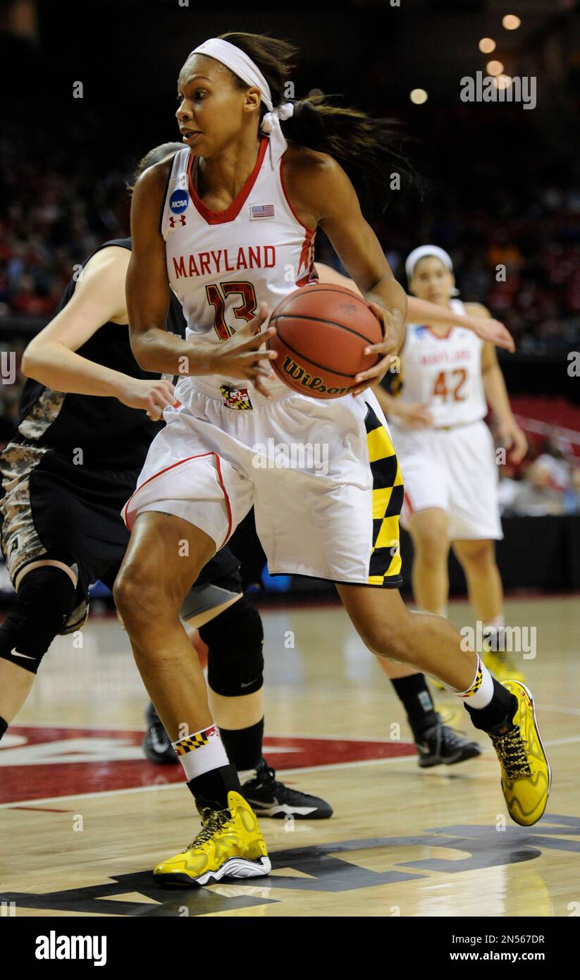 Maryland's Alicia DeVaughn drive to the basket against Army during the