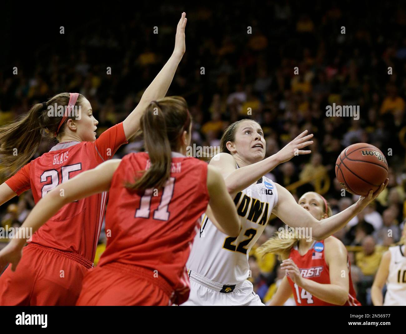 Iowa guard Samantha Logic, right, drives to the basket past Marist's ...