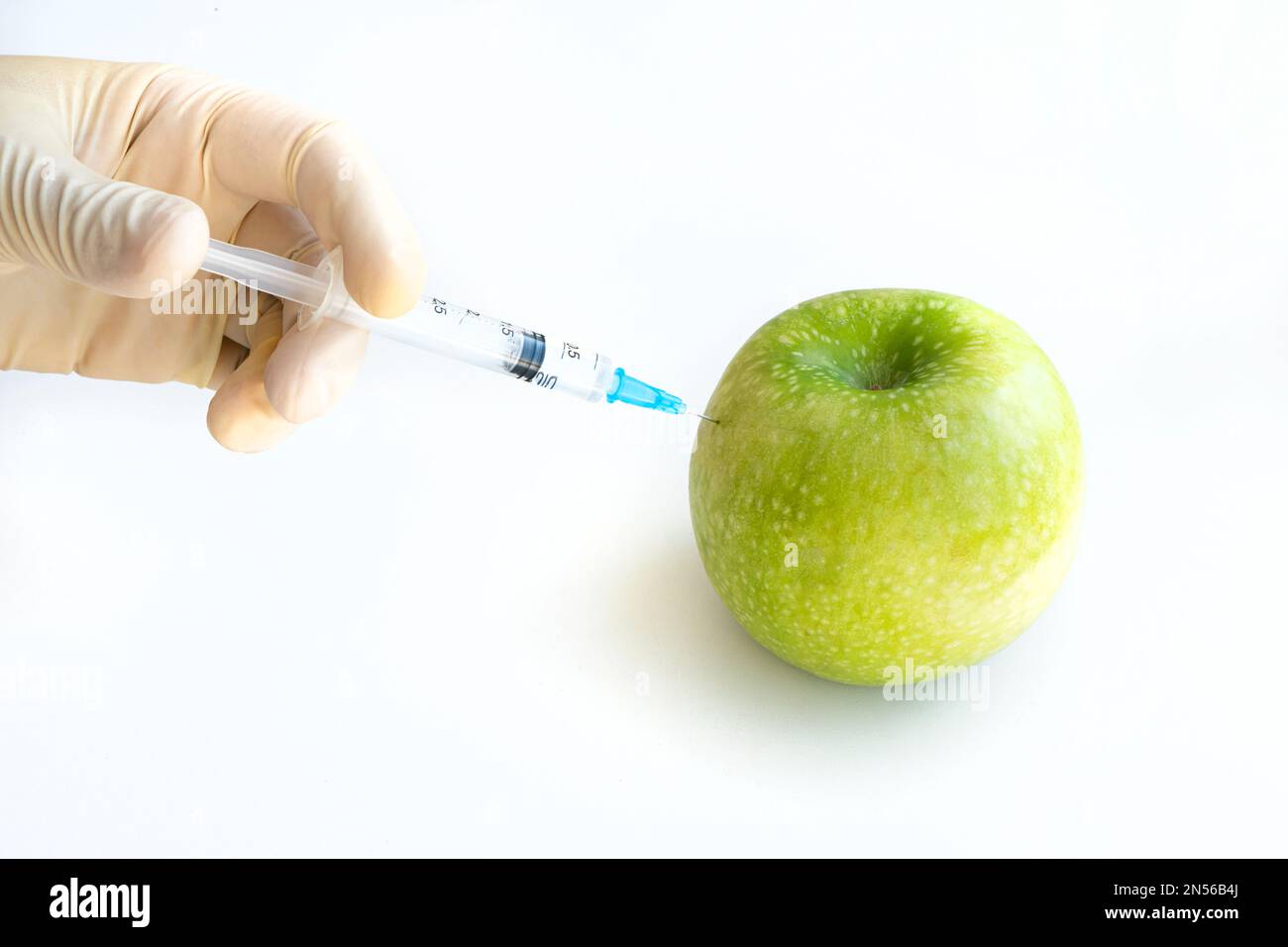 Gmo concept scientist makes injection hi-res stock photography and ...