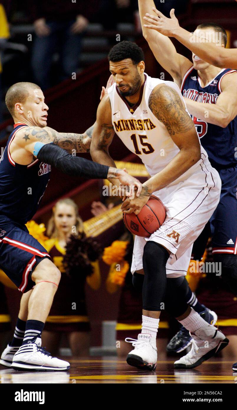 St. Mary's guard Kerry Carter, left, battles for the ball with