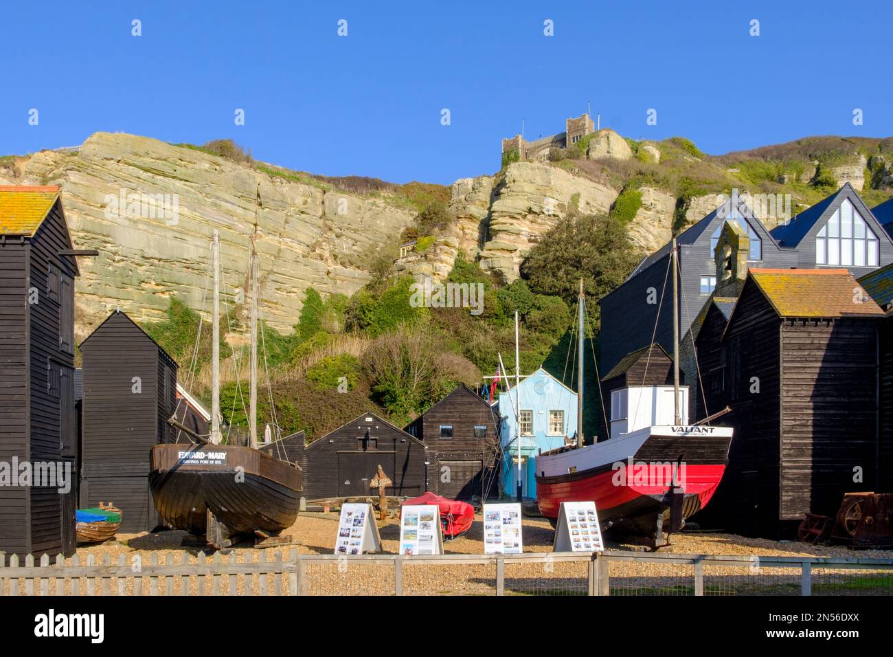 Hastings, Maritime Quarter, Historic Boats and traditional black-tarred net huts, outdoor Museum, Rock-a-Nore, East Sussex, UK Stock Photo