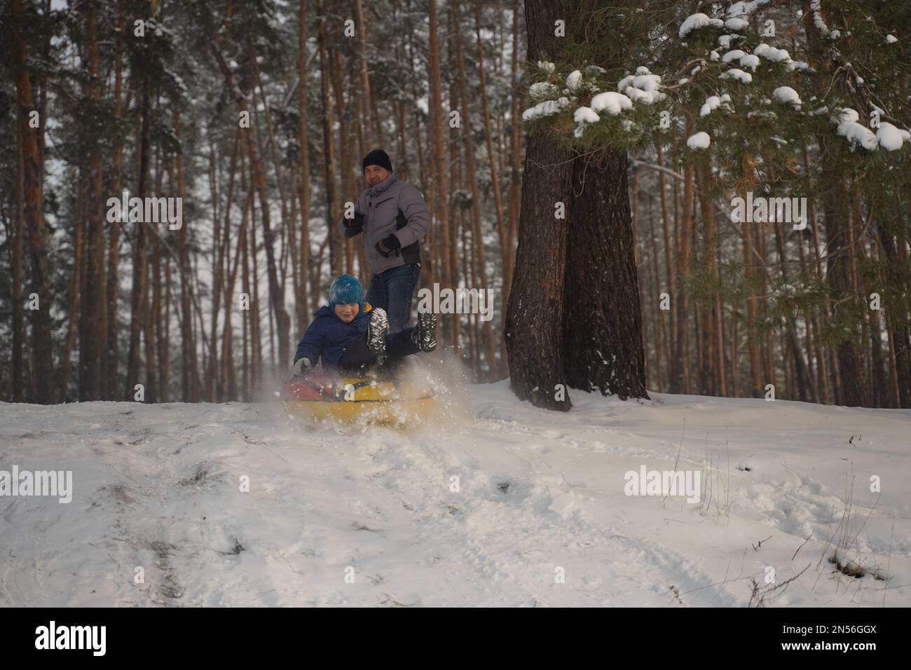 Extreme tubing descent from the mountain. Tubing flight in a splash of