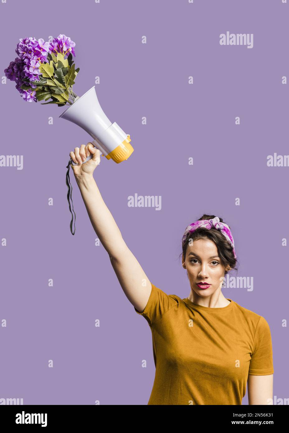 woman holding megaphone cardboard with me too sign. Resolution and high quality beautiful photo Stock Photo