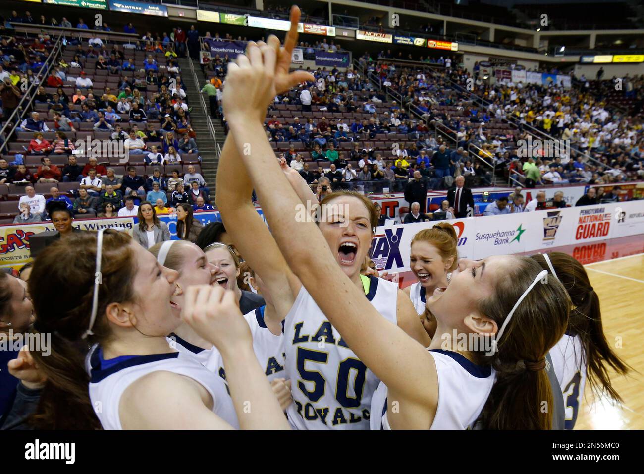 Members of Vincent Academy cheer after defeating Old 5834 at the