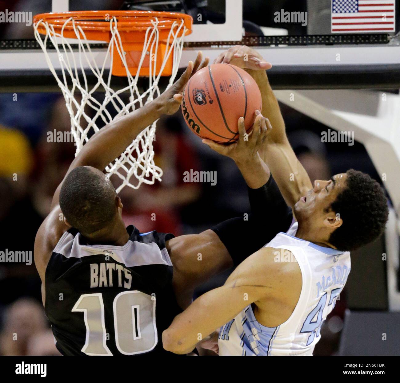 North Carolina's James Michael McAdoo (43) defends as Providence's ...