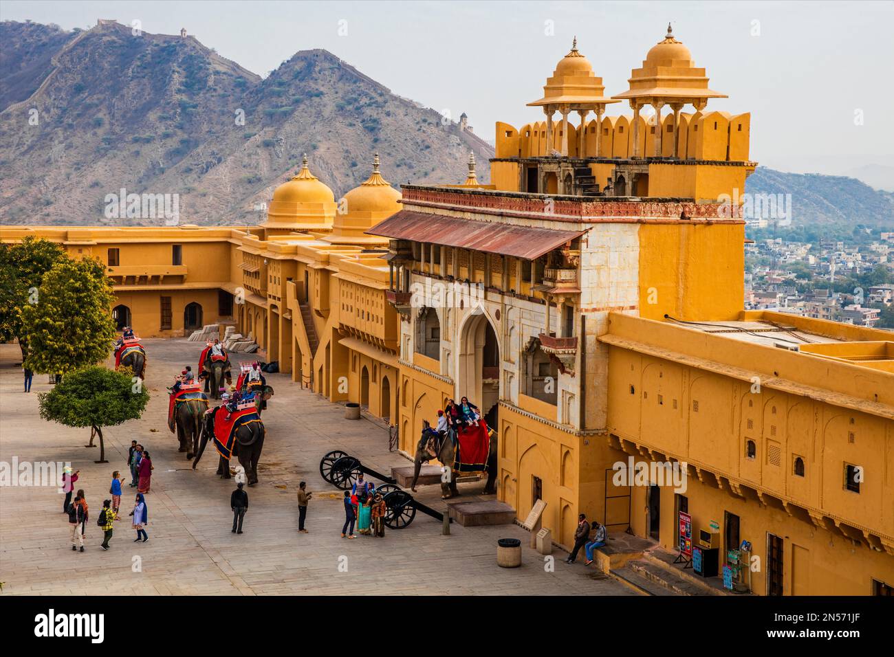 On the back of elephants to Amber Fort, Amber, Rajasthan, India Stock ...