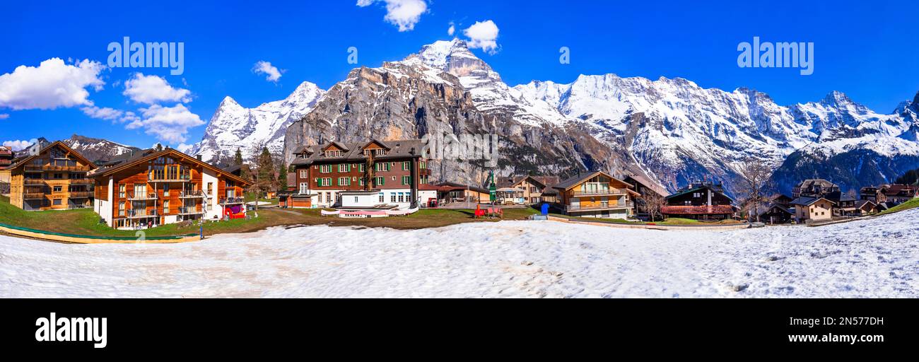 Switzerland nature and travel. Scenic traditional village Murren surrounded by snow peaks of Alps mountains. Popular tourist destination and ski resor Stock Photo