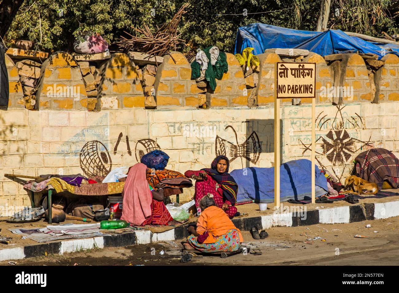 Slum dwellers on the street, Jaisalmer, an exotic city in the Thar desert, Jaisalmer, Rajasthan, India Stock Photo