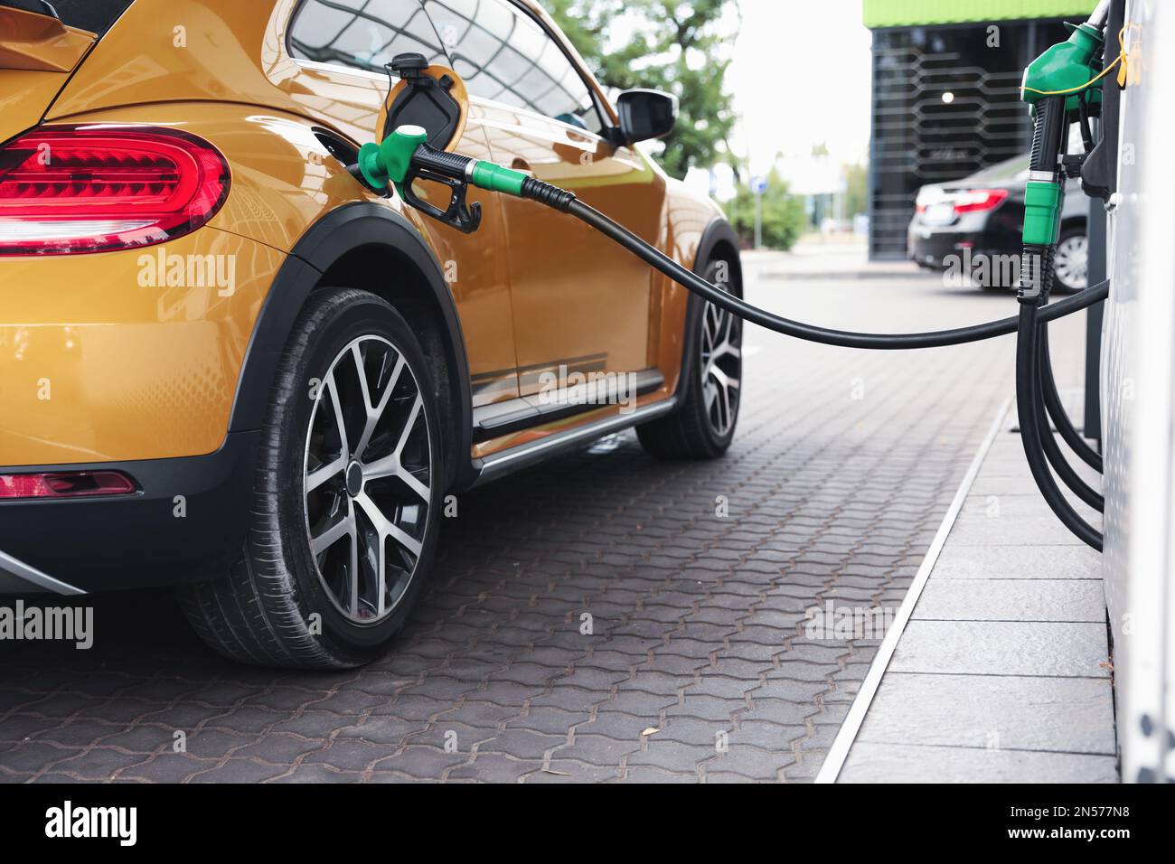 Refueling modern car at gas filling station, closeup Stock Photo - Alamy