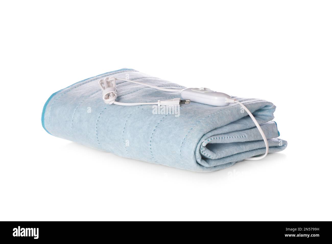 Folded electric heating pad isolated on white Stock Photo