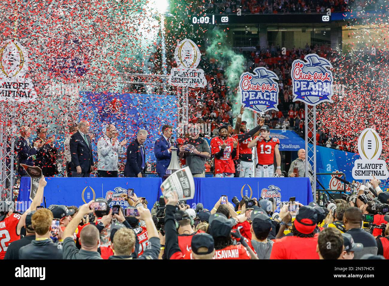 https://c8.alamy.com/comp/2N57HCX/december-31-2022-the-trophy-presentation-after-the-chick-fil-a-peach-bowl-a-college-football-playoff-semifinal-featuring-the-4-ohio-state-buckeyes-and-the-1-georgia-bulldogs-played-at-mercedes-benz-stadium-in-atlanta-georgia-the-georgia-bulldogs-come-from-behind-to-defeat-ohio-state-42-41-cecil-copelandmarinmediaorgcsm-2N57HCX.jpg