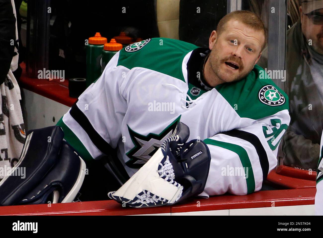 Dallas Stars goalies Tim Thomas (30) watches the replay of a Pittsburgh Penguins third-period goal as it is reviewed by officials during an NHL hockey game in Pittsburgh, Tuesday, March 18, 2014.