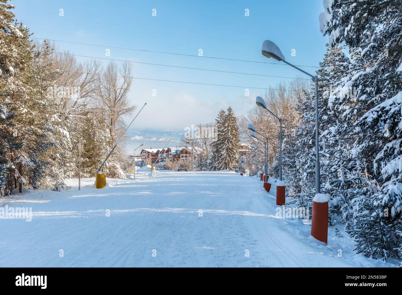 Bansko, Bulgaria bulgarian winter resort with ski slope, lift cabins and gondola station Stock Photo