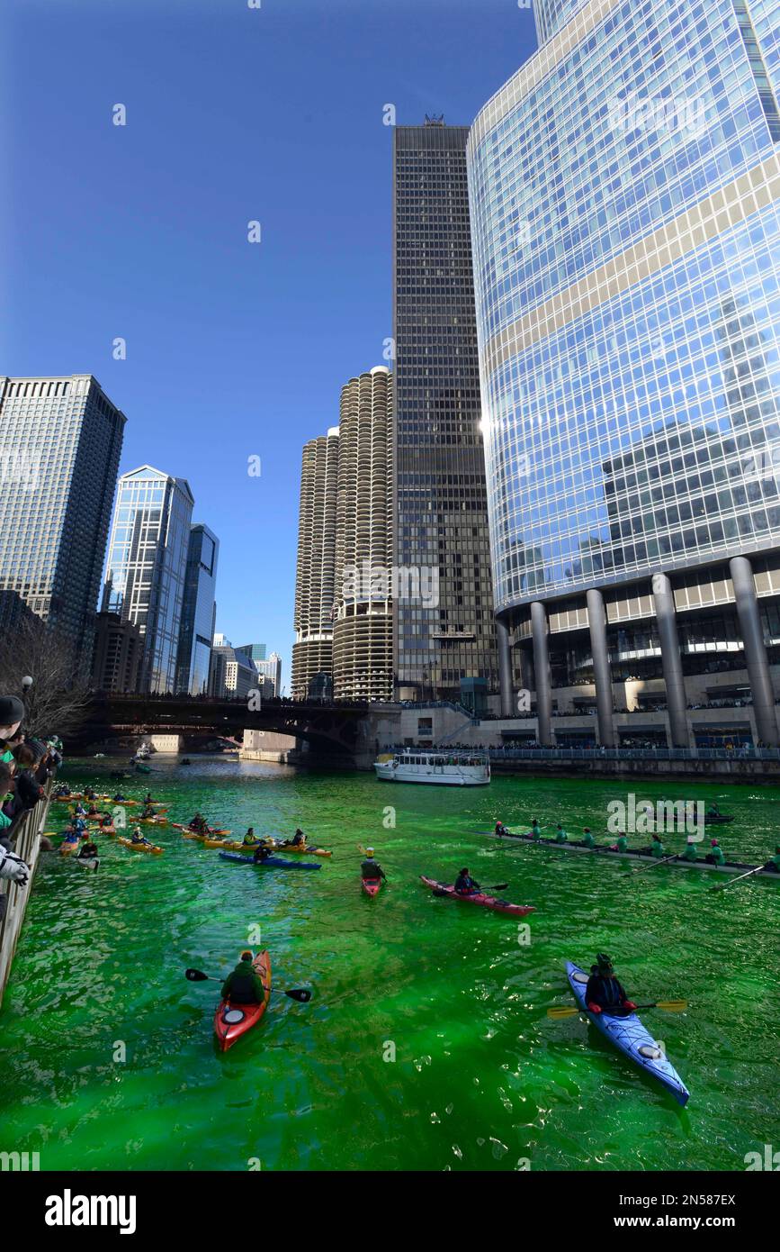 Chicago Float Kayakers float on the Chicago River after being dyed green ahead of the ...