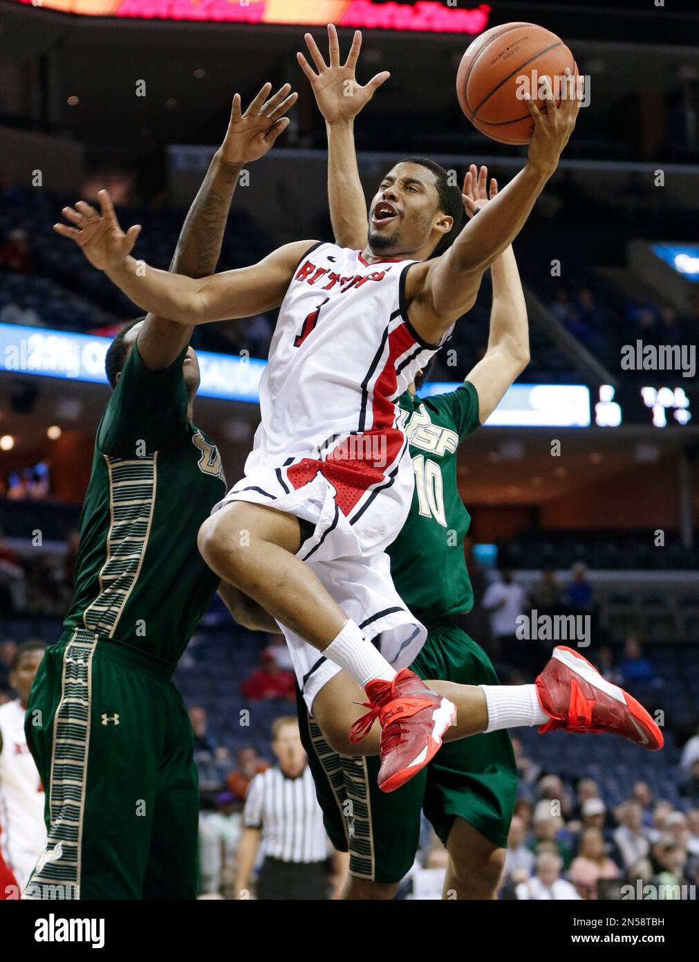 Victor Rudd Rutgers guard Jerome Seagears, front, drives past South Florida ...