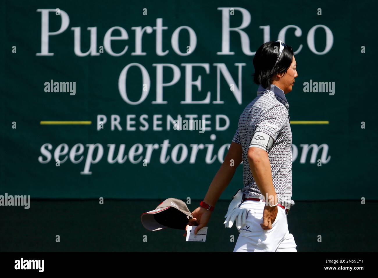 Japan’s Ryo Ishikawa exits the golf course after finishing the last