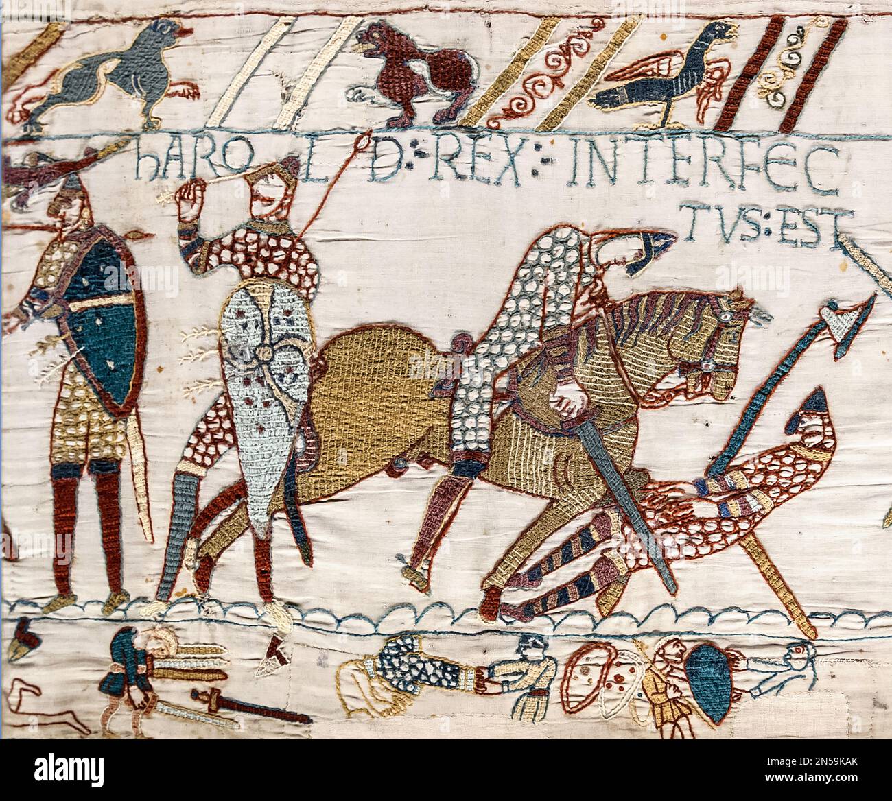 BATTLE OF HASTINGS King Harold  at left is killed by an arrow in the eye as shown in the Bayeux Tapestry Stock Photo