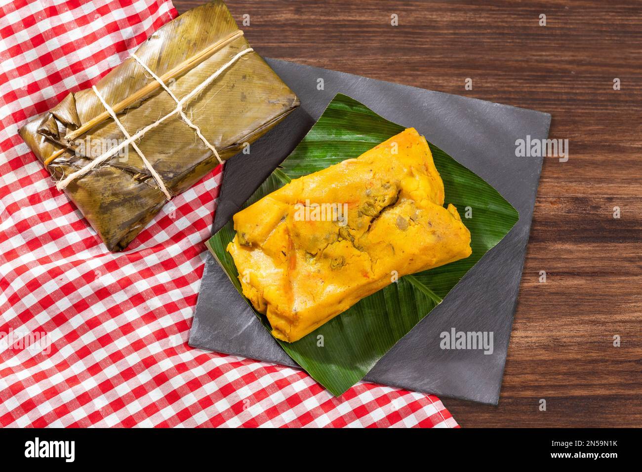 Tamale Typical Colombian Food Wrapped In Banana Leaves Stock Photo Alamy