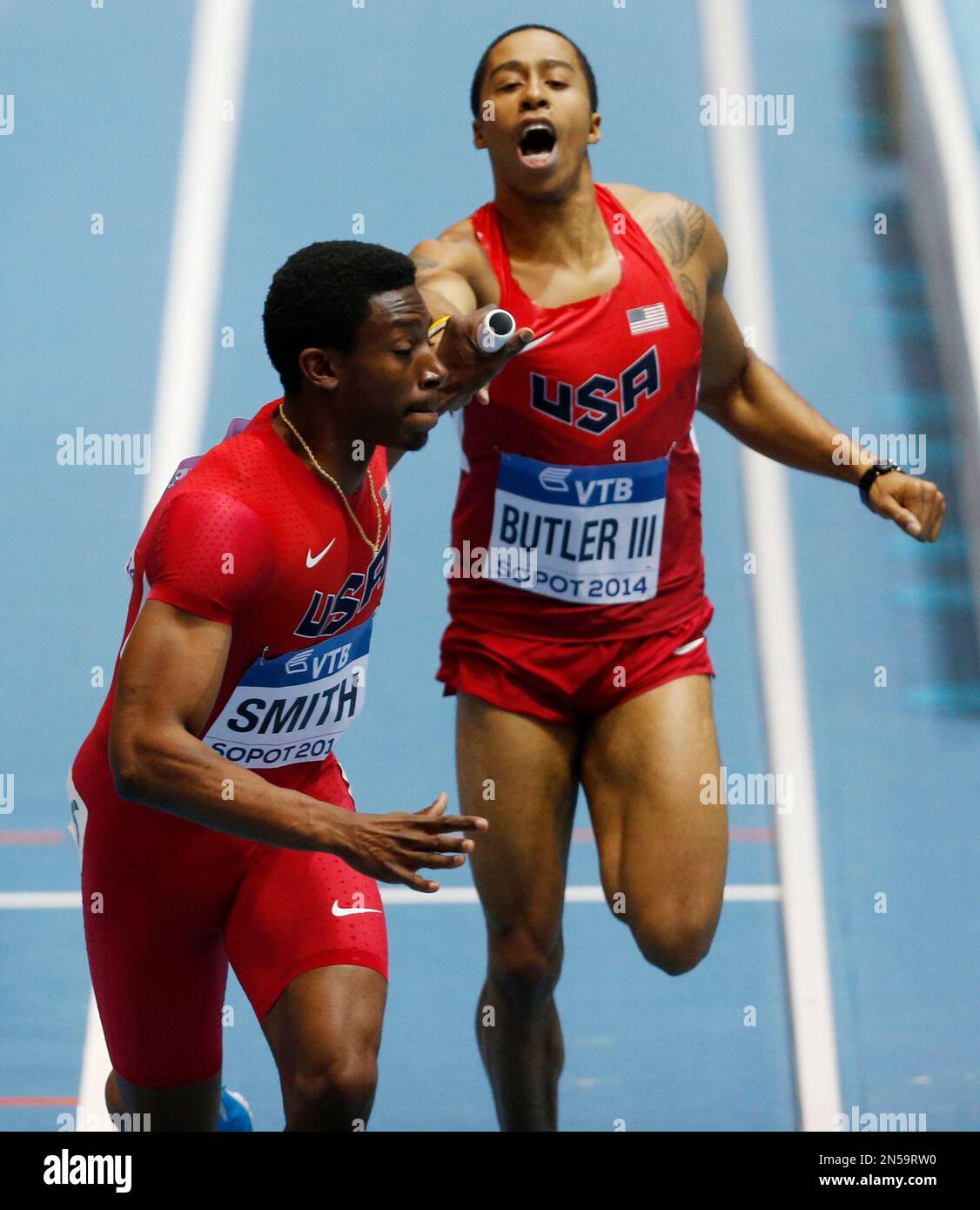 Kind Butler Indiana United States' Kind Butler, right, hands over the baton to Calvin Smith ...