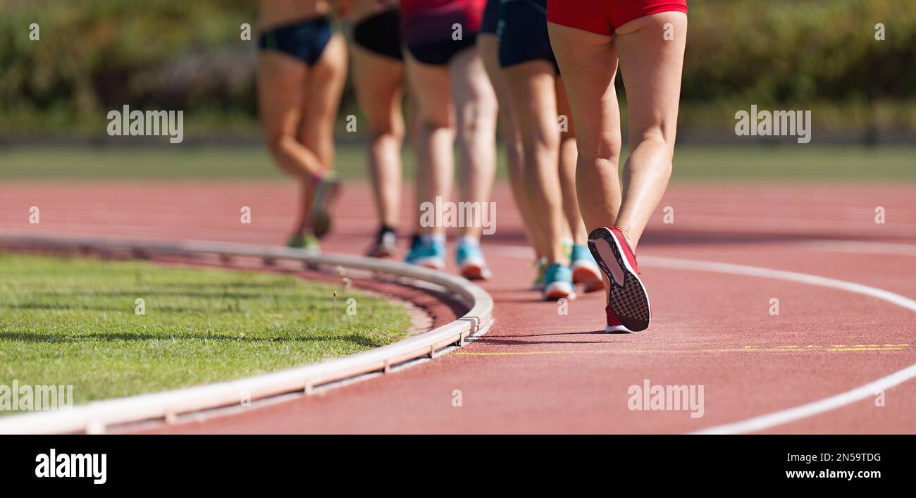 Athletes on track in race walk competition, race walking on athletic