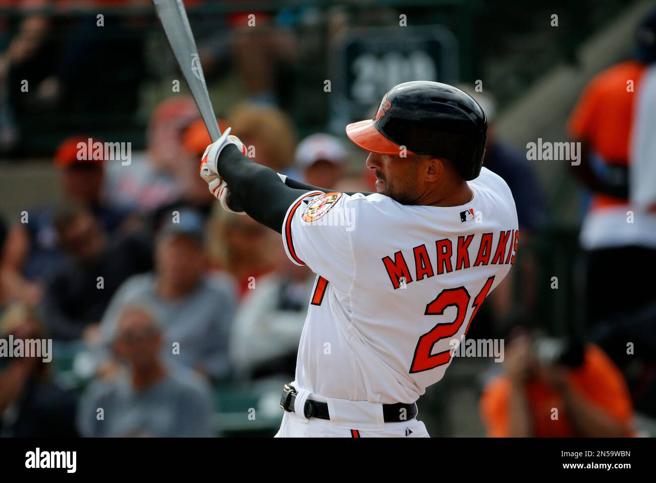 Baltimore Orioles' Nick Markakis hits a triple off Philadelphia
