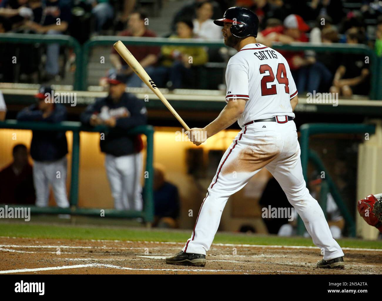 Atlanta Braves catcher Evan Gattis (24) bats in a spring exhibition