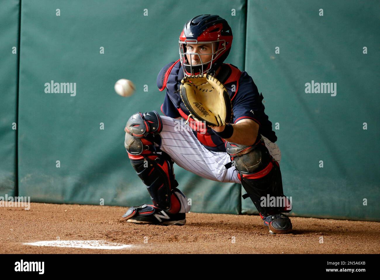 Minnesota Twins catcher Eric Fryer works out in the bullpen before an