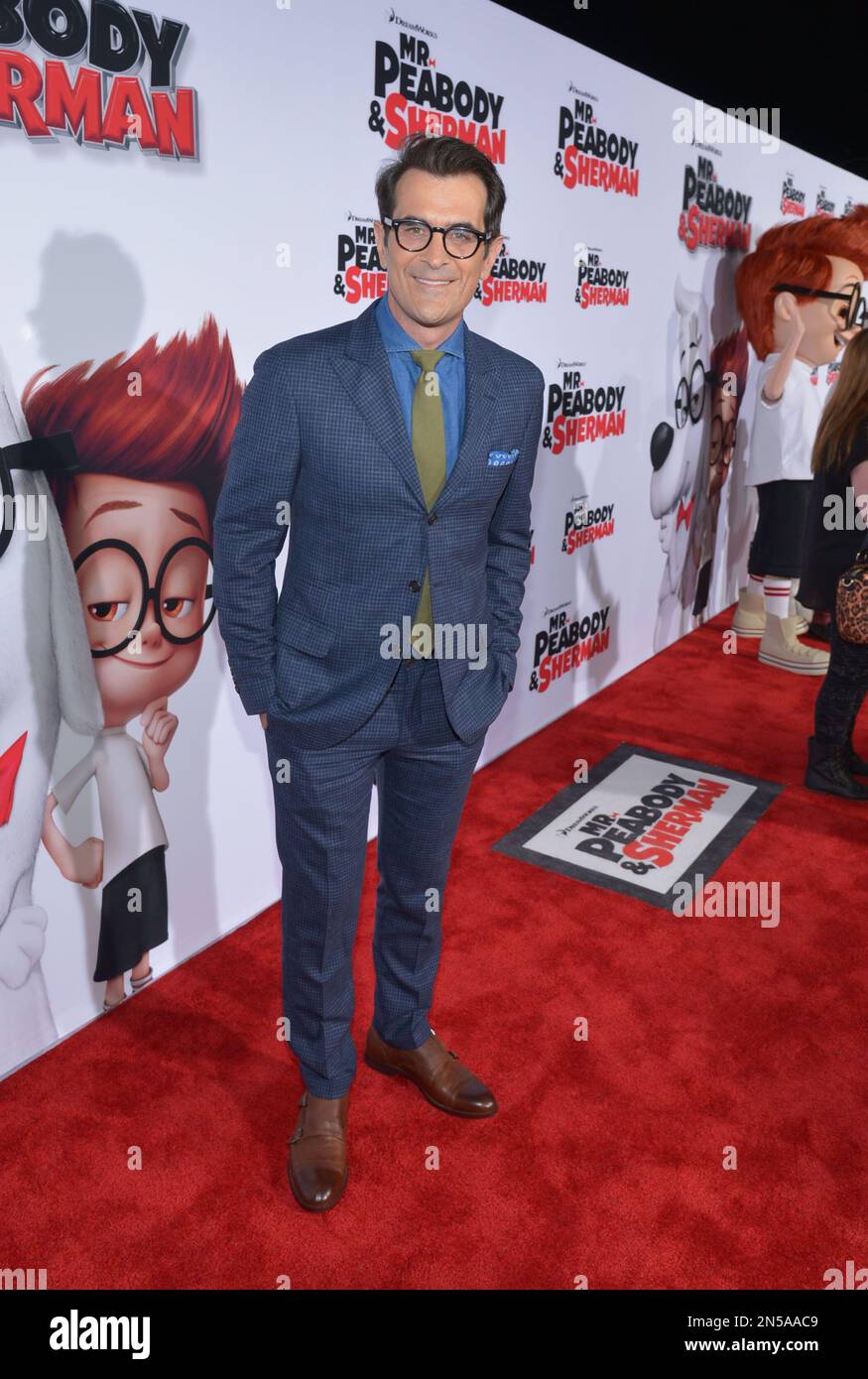 Cast member Ty Burrell, the voice of Mr. Peabody in the animated motion  picture Mr. Peabody & Sherman attends the premiere of the film at the  Regency Village Theatre in the Westwood section of Los Angeles March 5,  2014. Storyline: Mr. Peabody, the