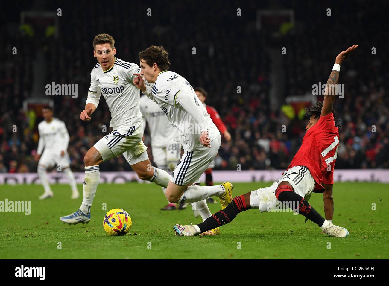 Manchester, UK. 8th Feb, 2023. Fred of Manchester United tries to tackle  Brenden Aaronson of Leeds United during the Premier League match at Old  Trafford, Manchester. Picture credit should read: Gary Oakley/Sportimage