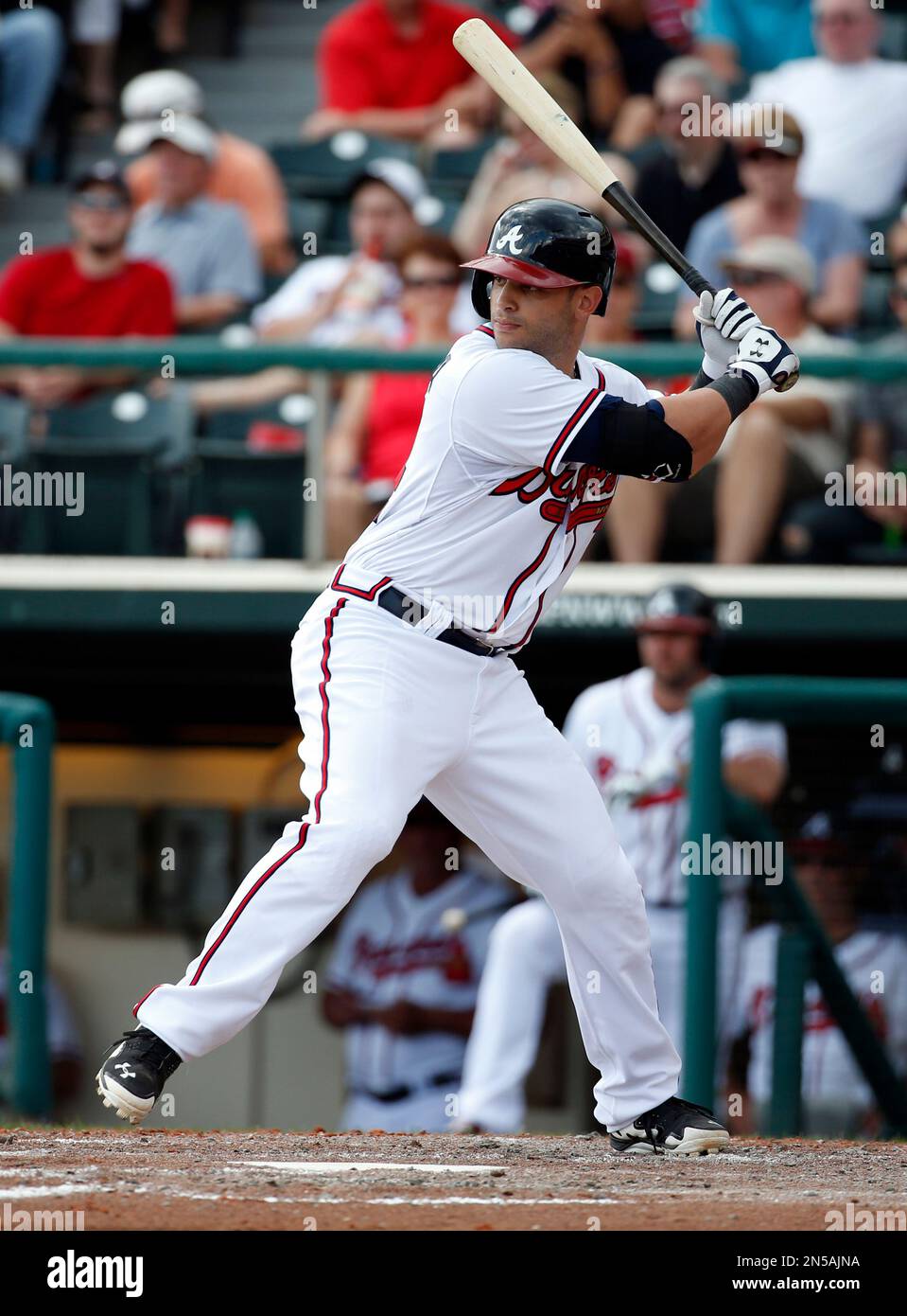 Atlanta Braves second baseman Tommy La Stella (84) bats in a spring