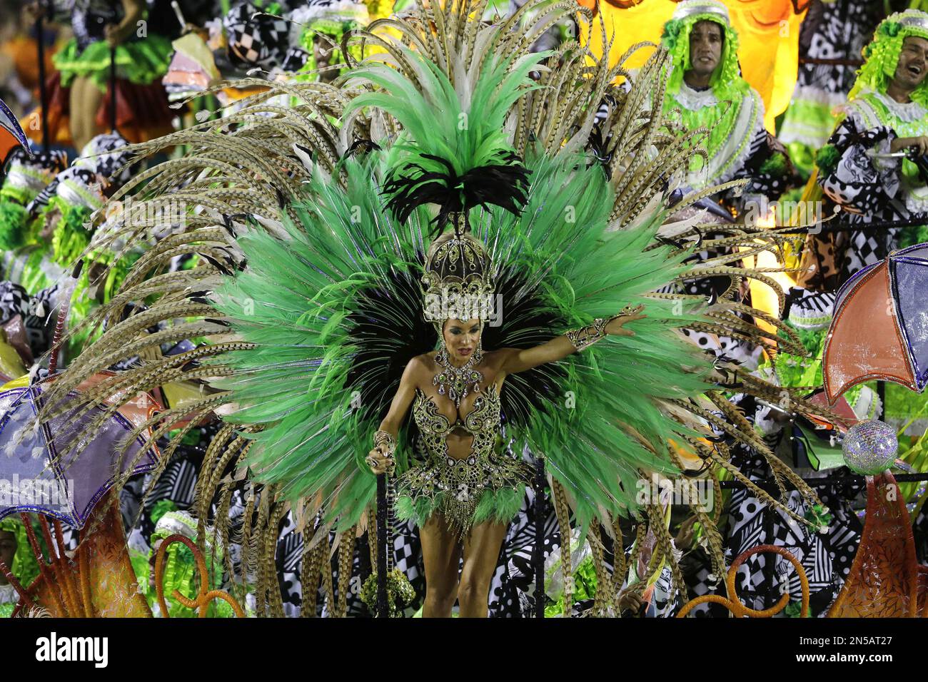 Performers from the Mocidade samba school parade during carnival ...