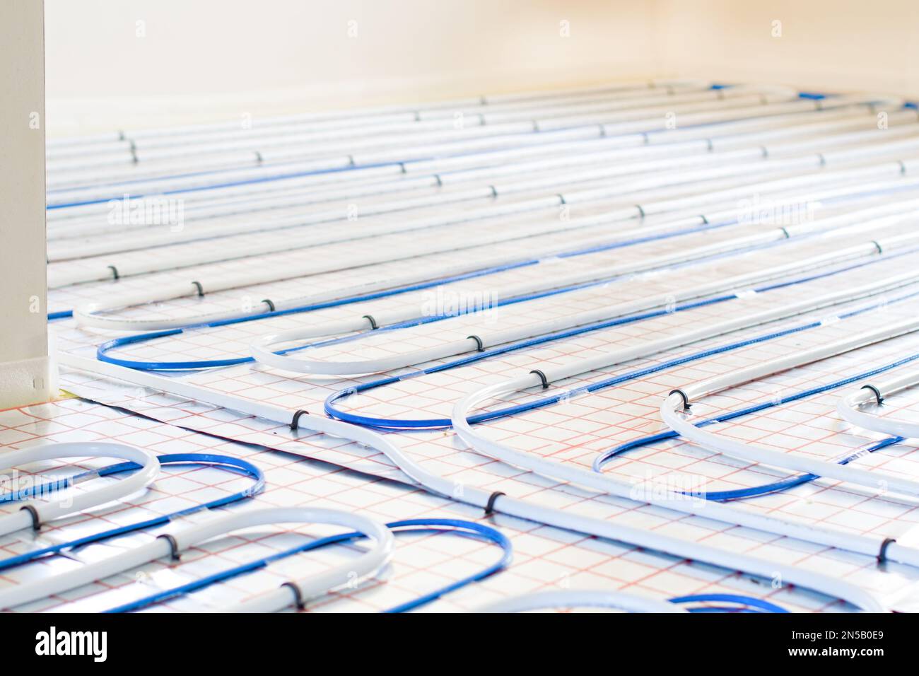 Underfloor heating system installation. Individual Heating. Stock Photo
